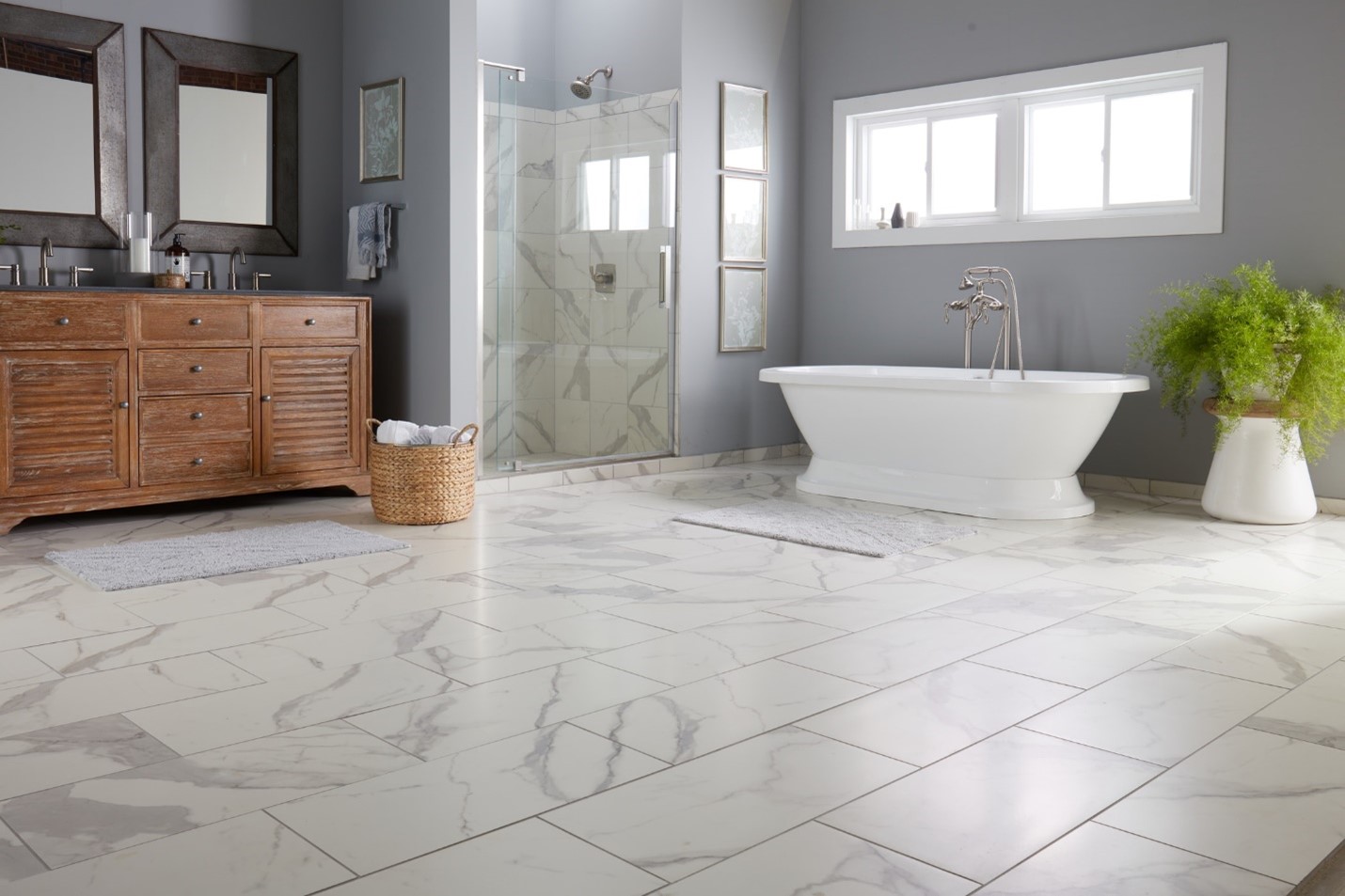 A bathroom with a white wall tile